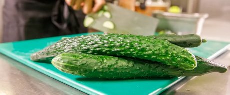Spined asian cucumber on a chopping board 